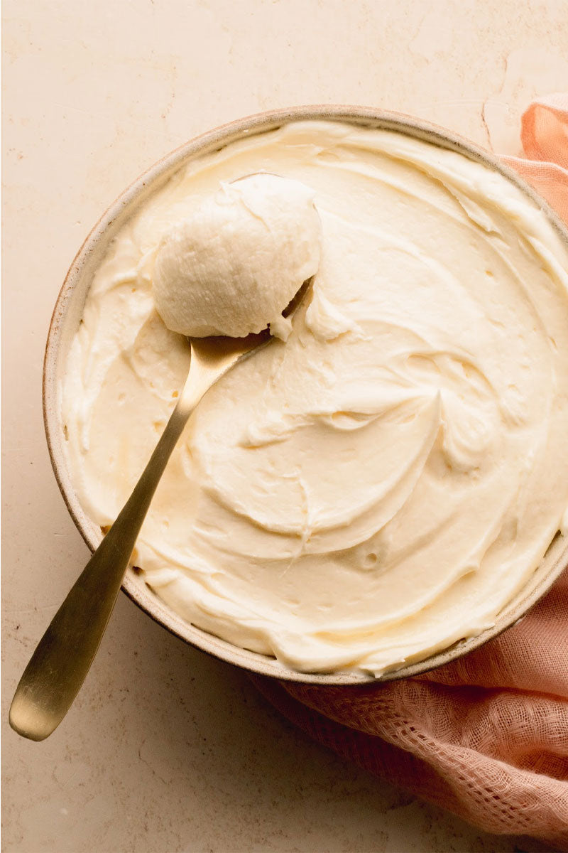Cream-Cheese-Frosting-in-Bowl-with-Spoon