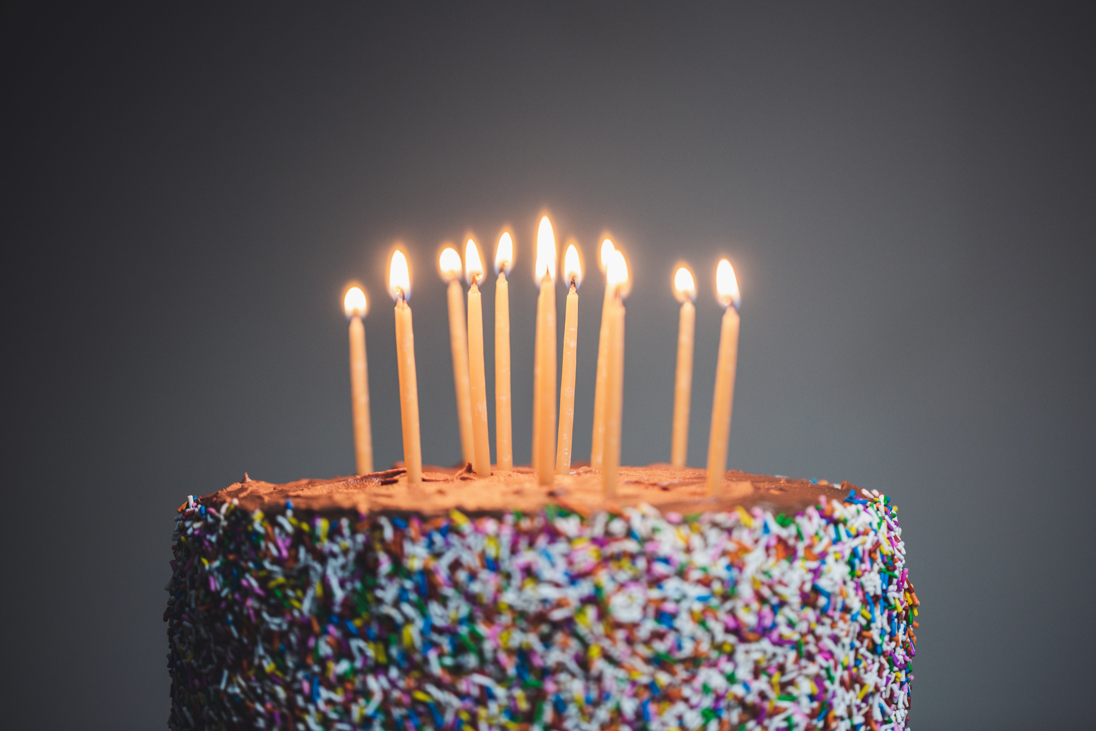 candles-lit-on-chocolate-cake